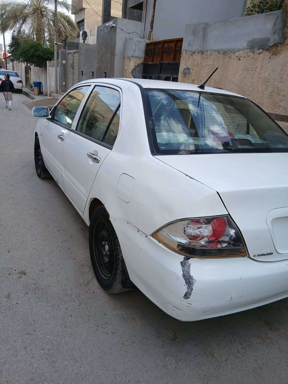 لانسر ٢٠١٠ شركة العامة بيها بارد السعر ٩٣بيها مجال *********** بعقوبة حي المعلمين
