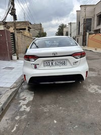 كورلا هايبرد موديل 25 ماشية 18 الف مكفولة من البارد والصبغ  سيارة رقم ...