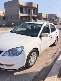 لانسر ٢٠١١ • قير ومكفول • سونار