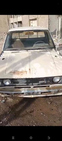 ا للبيع سياره داكسن بغداد رقم تسقيط الشراي يتصل على رقم 07831475383