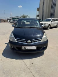 Nissan tida 2009 نيسان تيدا ٢٠٠٩ صندوق  (شاشە ئايپاد - کاميرە - ئاوێنە...