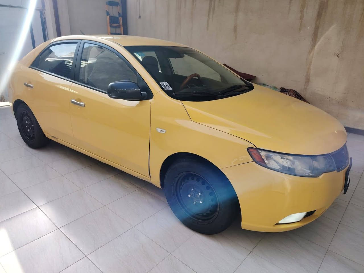 السلام عليكم كيا فورتي وارد أمريكي موديل 2011 حره تحويل ثاني يوم مشروع وطني سنويه ل 30 هزه جديده رقم بغداد بسمي مكفوله من الضربه والتبديل كير ومكينه وحداديه وتبريد تدفئه اربع تايرات جديدات دواخل جدد صبغه جديده مصفره هيئه وغرامات خط وبحث جوال ترايه كلش حلو السعر 80 مكان السيارة الناصريه مدينه الصدر التصال ***********
