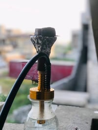 أركيلة بحالة جيدة، مثالية للجلسات مع الأصدقاء والعائلة. تصميمها أنيق و...