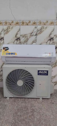 سبلت للبيع اواكس 1طن تحكم بلانبيريه تدفئه وتبريد مداخل تصليح جهاز نضيف...