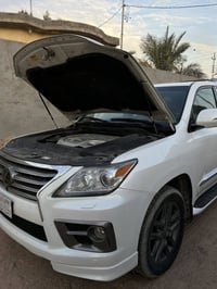 لكزس بريم • ٢٠١٤ • كشنات جلد