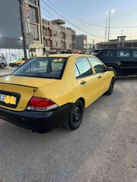 لانسر ٢٠١٠ • محرك وكير • تبريد ثلج