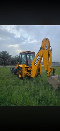جي سي بي  موديل 2004 مكفولةمن قطرت الصبق لا فطرولالحيم مكينة كير اكسل ...