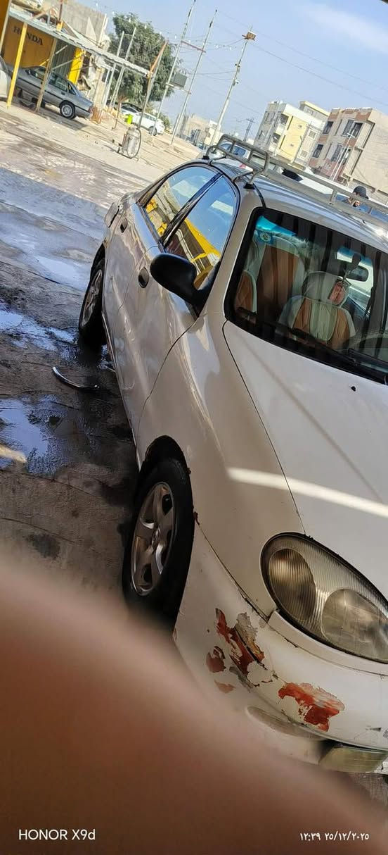 السلام عليكم دايو لانوس موديل ٩٧ رقم انبار باسمي كير عادي سياره كفاله عامه من كير ومحرك وصدر وتخم تاير ويل كب حتا الاسبير كهرباء كله شغاله وغراض التبريد كامله مابيه اي نقص والكشر كدام العين للبيع او مراوس حسب القناعه السعر 25 وبيه مجال مكانها التأميم قرب جامعة الانبار الاتصال على الرقم
 (***********)
