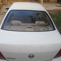 نيسان صني ٢٠٠٩ بيه 3 قطع رقم بغداد ٧٩ وبيه مجال 07759453259
