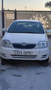 تيوتا كورلا للبيع موديل 2002 تخم تايرات جديد وصدر وحداديه جديد السعر 6...