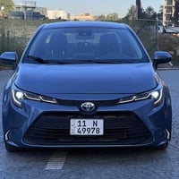 كورلا هايبرد 2022 LE بصمة ودشبول ديجتال  رقم بغداد باسمي ماشية 49 الف ...