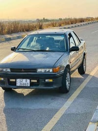 لانسر ٩١ • باسمي • محرك شرط