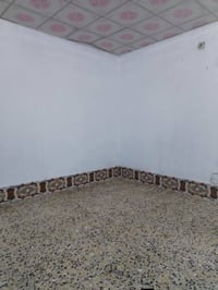 نجف حي ميسان • ١٠٠م • غرفتين وصالتين