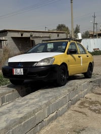 لانسر للبيع موديل 2009لاستفسار التصال علا 07718126543