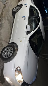 نيسان سني للبيع موديل 2010 رقم انبار محرك قبق اسود جديد  كير اوتو تبري...