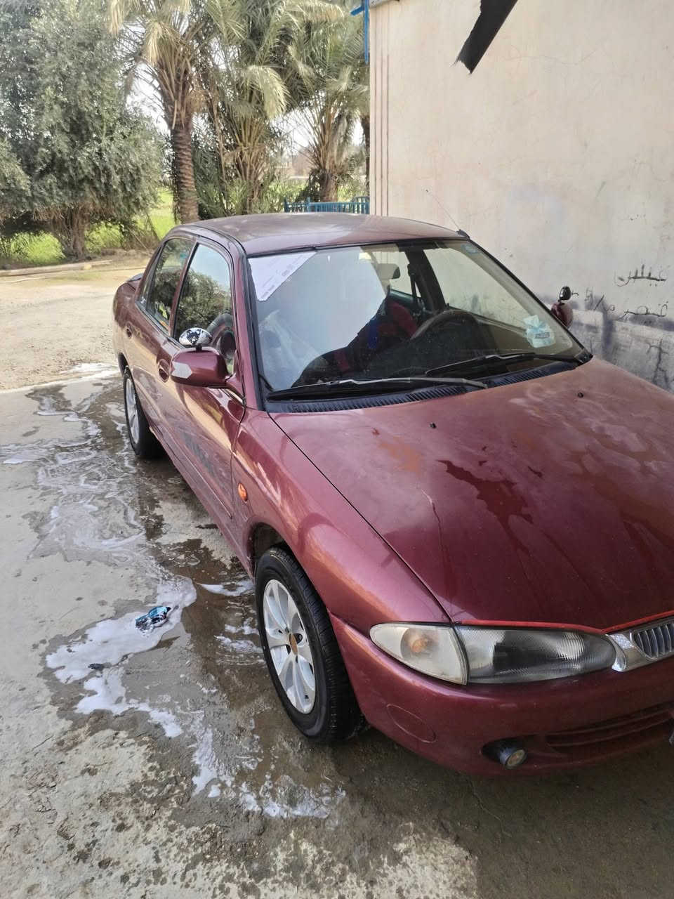 بروتون موديل 2002 كير عادي سياره نضيفه ماناقصه لو برغي تدفيه تبريد سياره مال جناي رقم انبار ***********  مكان سياره الرمادي سعره ٥٢ وبيه مجال لشراي
