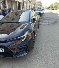 كورلا موديل 25 بغداد هايبرد se  فول موصفات ماشيه 5  ألف حادث بجم تعديل...