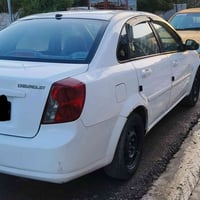 2005 موسسة بدون ضرر بدون صبغ بدون حادث كير عادي محرك وكير شرط هزه جديد...