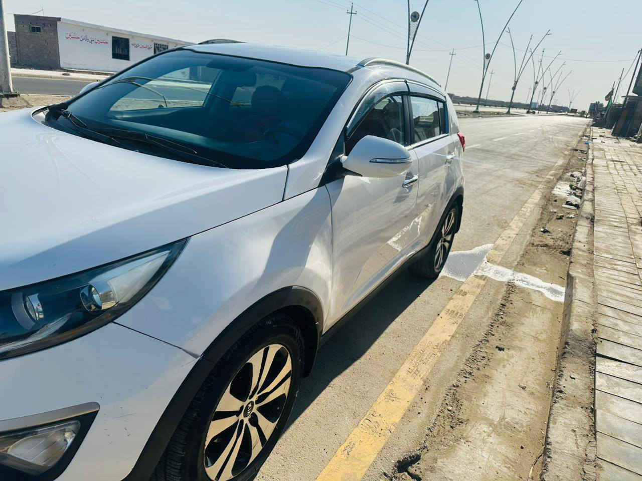 سبورتج 12خليجي رقم واسط محرك 2000 دوش شاشة وكامرة وحساسات تحكمات ستيرن السعر 110 موجودة بالنعمانية ***********  ٫٫٫***********
