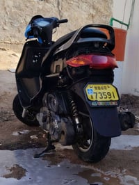 فراشة • مكينة جديدة • كوفة