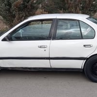 نيسان بريميرا • ١٩٩٢ • لوحة بلاستيكية