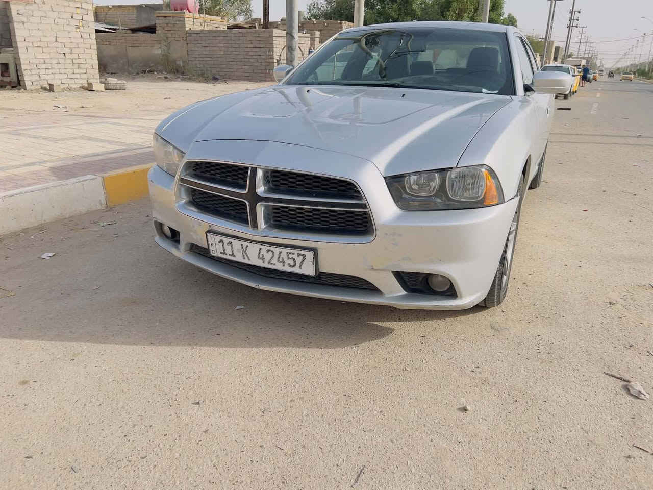 جارجر موديل 11 
بيها قطعتين تبديل 
مكينه و كير  تبريد خير من الله 
حداديه تخم تاير جديد 
منضومه زنون 
السياره ما ناقصها كلشي
السعر 115
مكاني ذي قار 
التصال ‏‪***********‬
