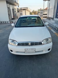 كيه سبكتره للبيع موديل 2002 رقم بغداد شرط التحويل كير اوتو مكينه 2000 ...