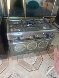 طوزخرماتو • ثلاجة مجمدة • طباخ