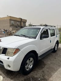 نيسان باتفندر 2007 se رقم بغداد انكليزي سياره فول عدا فتحه بيها قطعتين...