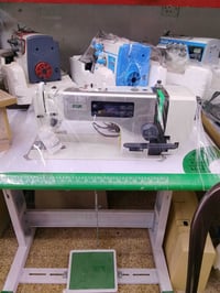 معرض وورشة مروان ولبيب عربو لتجارة مكائن الخياطة الصناعية والمنزلية(بي...