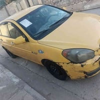 اكسنت موديل 2009 أمريكي رقم بغداد محرك كير شرط كير تماتيك. مصفرة هيئا ...