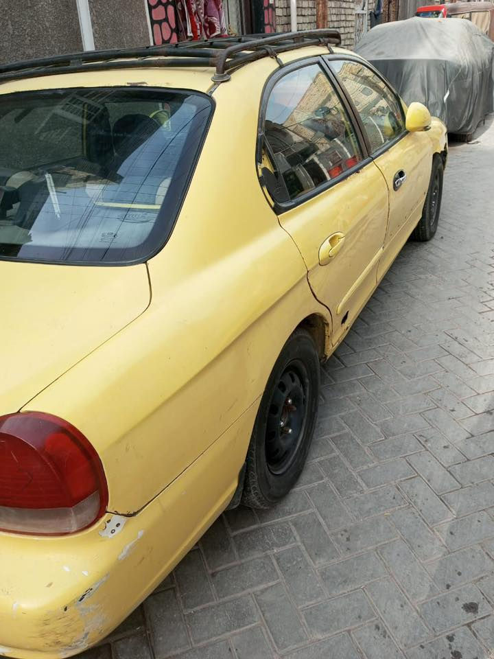 السلام عليكم
سوناتا موديل 2001خصوصي وليس أجره 
رقم بغداد كير ومحرك كورله وبيها نقوصات كما واضح في الصور للاتصال *********** العنوان بغداد الشعب علمن أنا مكلف في النشر
