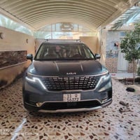 كيا كرنفال ٢٠٢٤ للبيع فول مواصفات رقم بغداد انكليزي ماشيه ٢٧ حادثها صن...