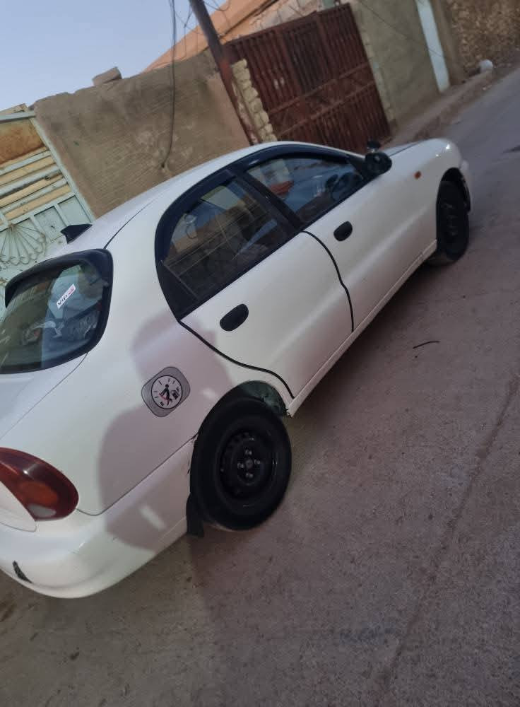 دايو لانوس محرك 1600 مفتوح كير  عادي رقم بغداد مشروع  45وبيها مجال بسيط  ***********,مكاني ابو اغريب الزيدان
