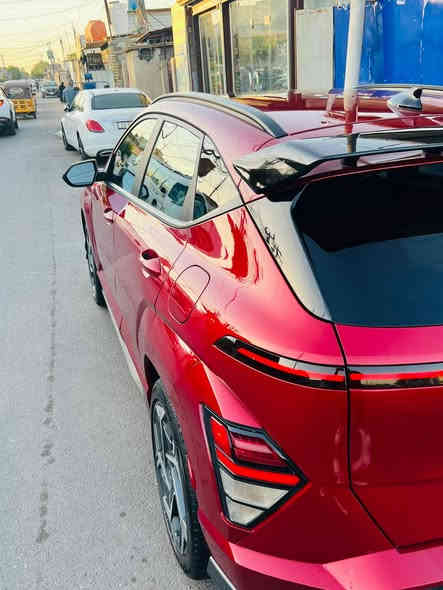 كونا 2024 N-Line / أعلى مواصفات 🔥
� للبيع | هيونداي كونا N Line موديل 

 

السيارة بحالة ممتازة جدًا، فئة N Line الرياضية من هيونداي، المواصفات .

المحرّك 1.6 تيربو بقوة 190 حصان، جير أوتوماتيك 8 سرعات، دفع أمامي (FWD)، أداء قوي وسحب ناعم.

🔹 المواصفات:

 • اللون الخارجي: أحمر مميز

بانوراما 

 • الداخلية: جلد أسود بتصميم رياضي

 • شاشة وسطية كبيرة تعمل باللمس

 • كاميرا خلفية + حساسات أمامية وخلفية

 • تشغيل بالبصمة ودخول ذكي

 • كراسي رياضية مريحة بشعار N Line

 • جنوط مقاس 19 إنج

 • نظام إضاءة LED كامل

 • نظام تكييف إلكتروني مزدوج

 • أنظمة أمان وتحكم متقدمة

        

🔹 ملاحظات إضافية:

 • حادثها قطعتين باب سايق ولخلفي والجاملغ كد اصبع بارد 

 • ماشية: (18 الف مايل 

📞 للتواصل فقط مع الجادين بالشراء    

 

السعر 18700

*********** 

مكان السيارة بغداد الجديدة 

مرقم بغداد
