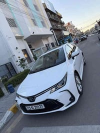 للبيع كورلا هايبرد 2024  فول مواصفات  سلايد فتحة سقف  ماشية 46 كيلو مح...