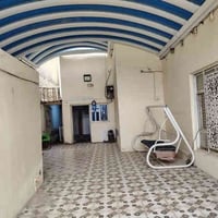 ديوانية حي الزهراء • ٢٦٨م • كراج مسقف