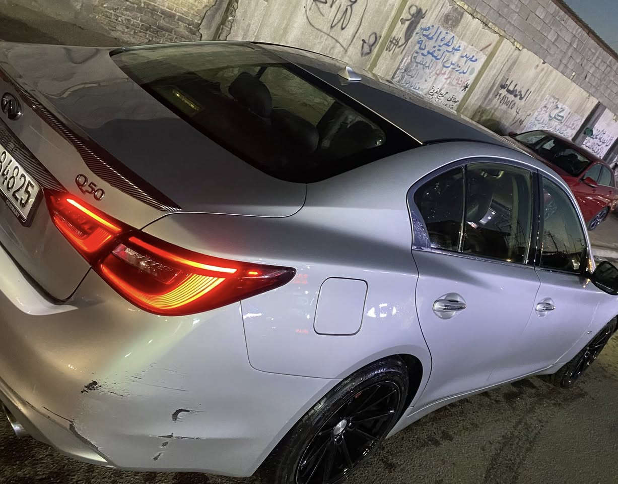 ---

*🚗 للبيع انفنتي Q50 2018 فول مواصفات*

*المواصفات:*
- *المحرك*: 3.0L V6 توين توربو 6 سلندر
- *اللون*: [رصاصي]
- *الدفع*: خلفي صاروخ 🚀🚀🚀

- *الممشى*: [105 ميل]
- *الرقم*: بغداد جديد انكليزي
- *السنوية*: جديدة
- *الحادث*: جاملغ ايمن امامي + صبغ صفحة السائق فقط كلير 

- *الكفالة*: مكفولة محرك وكير وشاصي

*المواصفات 😗
- فول مواصفات: فتحة سقف، 
بصمة ابواب وصندوك 
-بصمة تشغيل
- شاشتين فول تحكمات 
نظام صوت بوس، 
حساسات، 
كاميرا 360
- كراسي جلد،، داخلة مكفول زلغ مابي
- لايت زينون بلادي، تراكشن كنترول، 

5مودات قيادة نورمل ايكو سبورت وثلوج وباقي التفاصيل

*الصرف والادامة:*
- ادامة كاملة مسويها تايرات 
- تيربوات جديدة 
- منظومة ماء كاملة جديدة
- كلشي بالسيارة جديد ومبدل، اصعد  واطلع

*السعر*: 128 ورقة 
قابل للتفاوض البسيط 

*المكان*: بغداد  
*للاستفسار*: [*********** ] - اتصال وواتساب  
اللي يجي يفحص ويتدلل، السيارة نظيفة وتستاهل.

نقص فقط شباك امامية بي كسر
