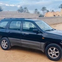 مازدا للبيع بتقسيط وبنقد بدون مقدمه شهر 300واتساب07800526029