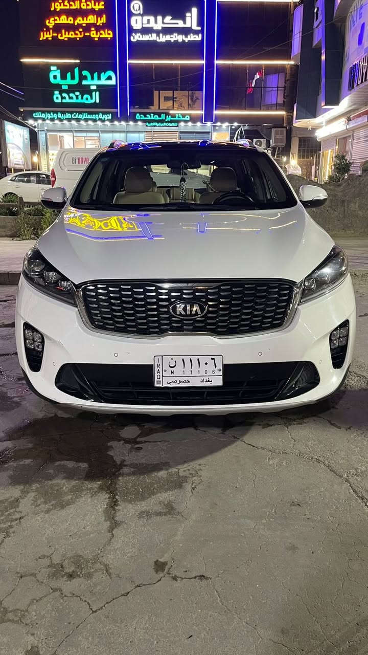 سورنتو ابيض 2018 خليجي بجم 2019
فول مواصفات 
ماشيه (142,000 ) 
 رقم السياره (بغداد )مشروع وطني بأسمي تحويل نفس اليوم مكان السيارة بغداد العامرية
السعر 235 وبيه مجال
السيارة بيها طخة بسيطة بالدعامية الخلفية ورصعة بالجنطة   مكفولة من الصبغ كفالة عامة 
مواصفات السياره 
محرك 6 سلندر 3500
كير 8 نمر
7 راكب
بنوراما 
تبريد ثلاث قطع مع التبريد الخلفي منفصل
شباك نيكل مع لد
تحكم ستيرن فول
مري شفط
بردات خلفية بلادي
شاشةمع نظام android و CarPlay  
نفيكيشن شغال 
نضام ملاحه جي بي اس GPS
انارة ترحيب ابواب ودوسات وداخل
جنطة كهرباء 
سايد ابريك رجل 
كامره خلفية دوارة
كشنات جلد الاصل كهرباء 
حساس امامي خلفي 
 5 ويل كب حجم 19 كروم 
 اربع انظمة قياده eco,sport, comfort, smart
***********
بغداد العامرية
