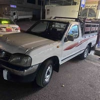 پیكاب نیسان مۆدێل2008 یەك پارچەی هەیە 07508440808لەهەولێر