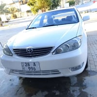 ورحمه وبركاته للبيع تيوتا كامري 2004 خليجي ياباني اصل   رقم نجف مميز 9...