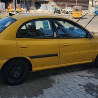 كيا ريو موديل ٢٠٠١ سنوية باسمي  كير ومحرك كورله تخم تاير جديد  باتري ج...