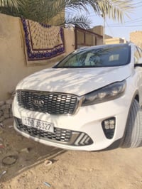 كيا سورنتو خليجي  رقم بغداد الماني بسمي  موديل ٢٠٢٠ لون ابيض  ٦ سلندر ...