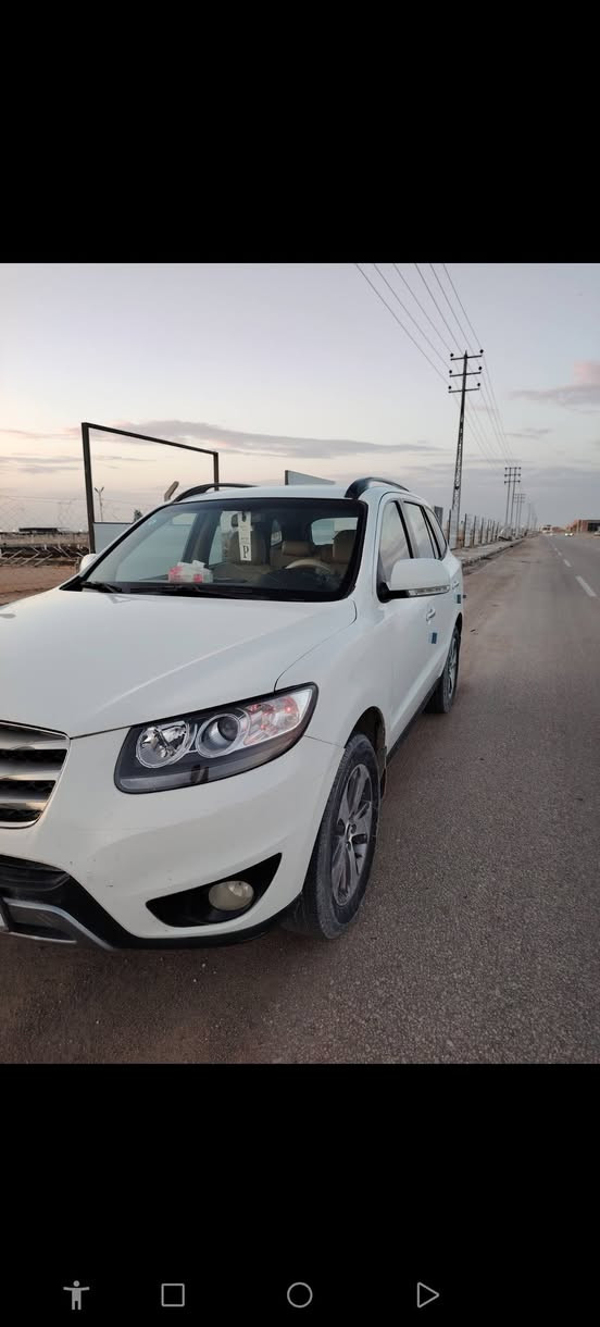 سنتافي 2012فول مواصفات خليجي مكفولة كفالة عامة 4سلندر 2400سبعة راكب مابيها نقص بسمي رقم دولي السعر 140ت***********
