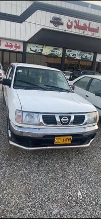 نيسان ده بل ساخ ساخ علوچ موديل 2002 ناو بور  گيرو مه كينه ي بيلاد  چوا...