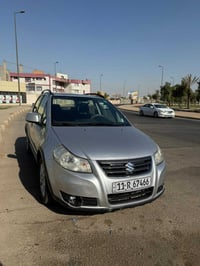 سازوكي sx4  موديل 2013  السيارة حلوه مكينه و كير و تبريد شغال بيهة صبغ...