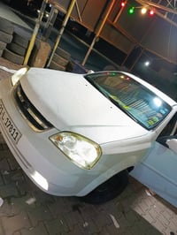 شۆفرلێت ئۆپترا مۆدیل 2013 گیر ئۆتۆماتیک دووپارچەی پێوەیە بێ ناو گرتن ڕ...