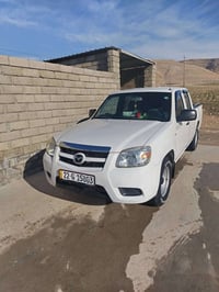 مازدا بيكم • دبل • كفالة عامة