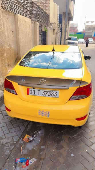 هونداي اكسنت موديل ٢٠١٣ بسمي أم صفره من كولشي رقم جديد المكينه والكير مكفولات كفاله عامه وارد أمريكي بكاني بغداد مدينه الصدر الرقم ***********
